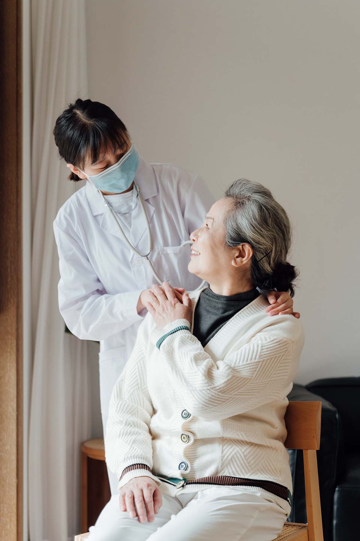 senior woman with young female doctor at home CSHHM.jpg
